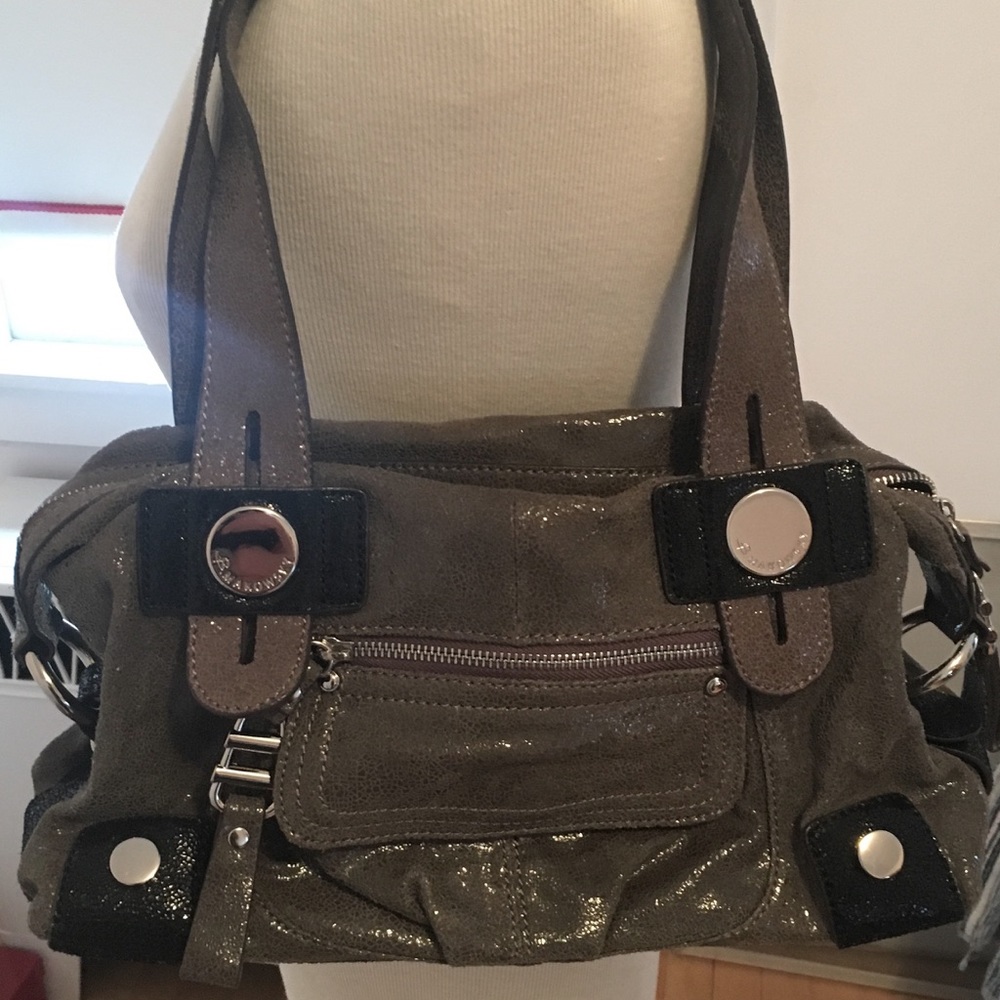 B Markowsky. Grey and black duffle style bag.